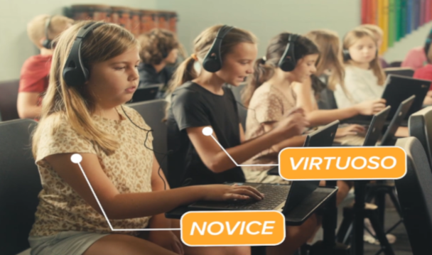 Student practicing independently with headphones using Songcraft